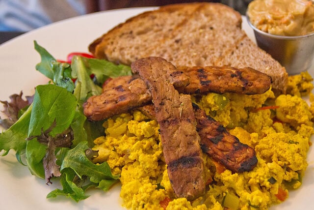 vegan breakfast with tofu scramble and tempeh bacon