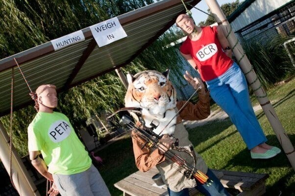 Mannequins with "PETA" and "BCR" written on them, hanging by their necks at G.W. Zoo